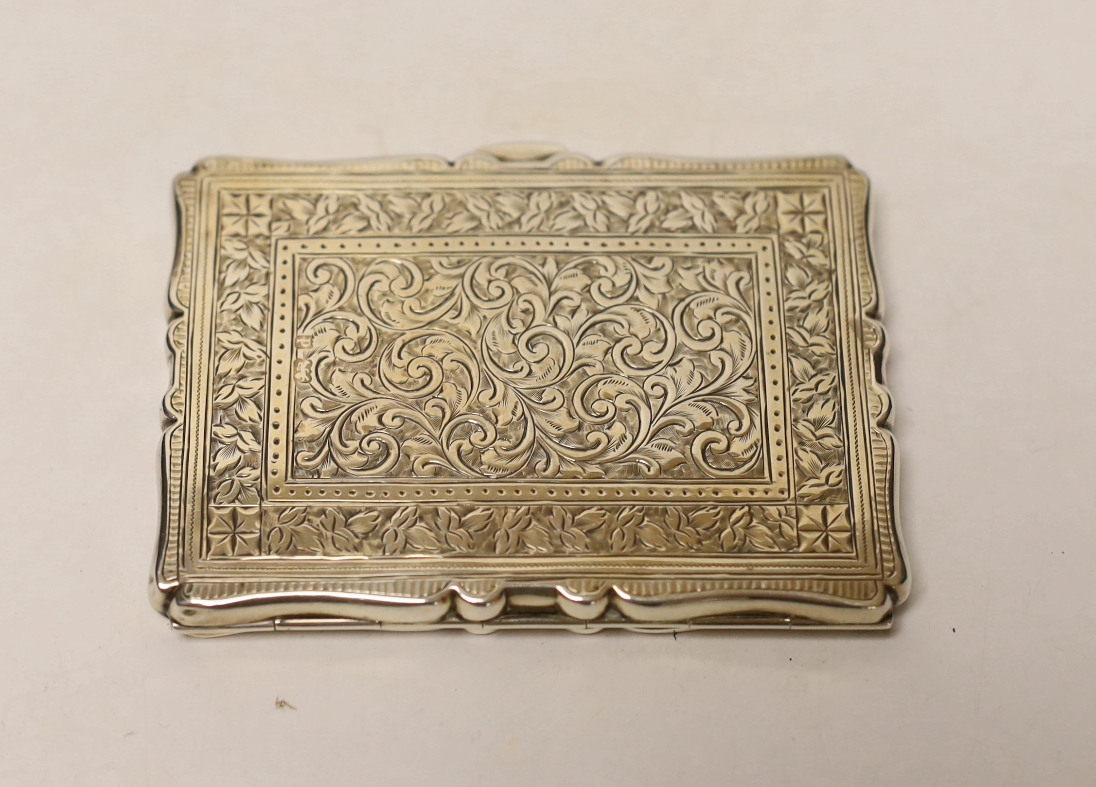 An Edwardian engraved silver card purse, Saunders & Shepherd, Birmingham, 1903, 9.8cm.